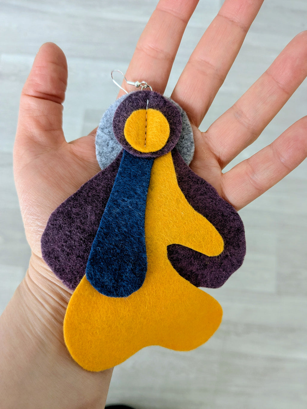 Single statement felt earrings in orange, purple, grey and blue