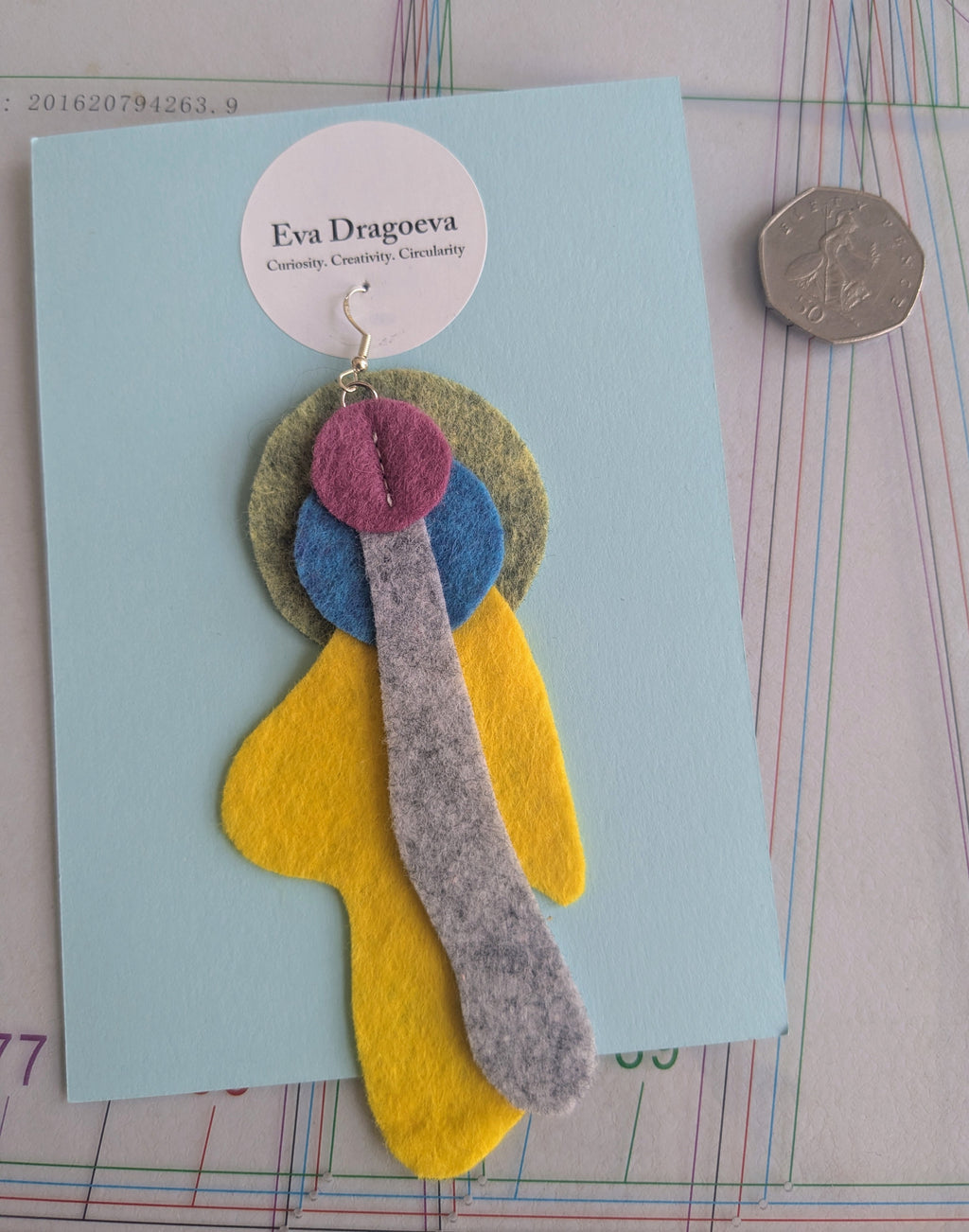 Single abstract felt earring in yellow, purple, blue, green and grey