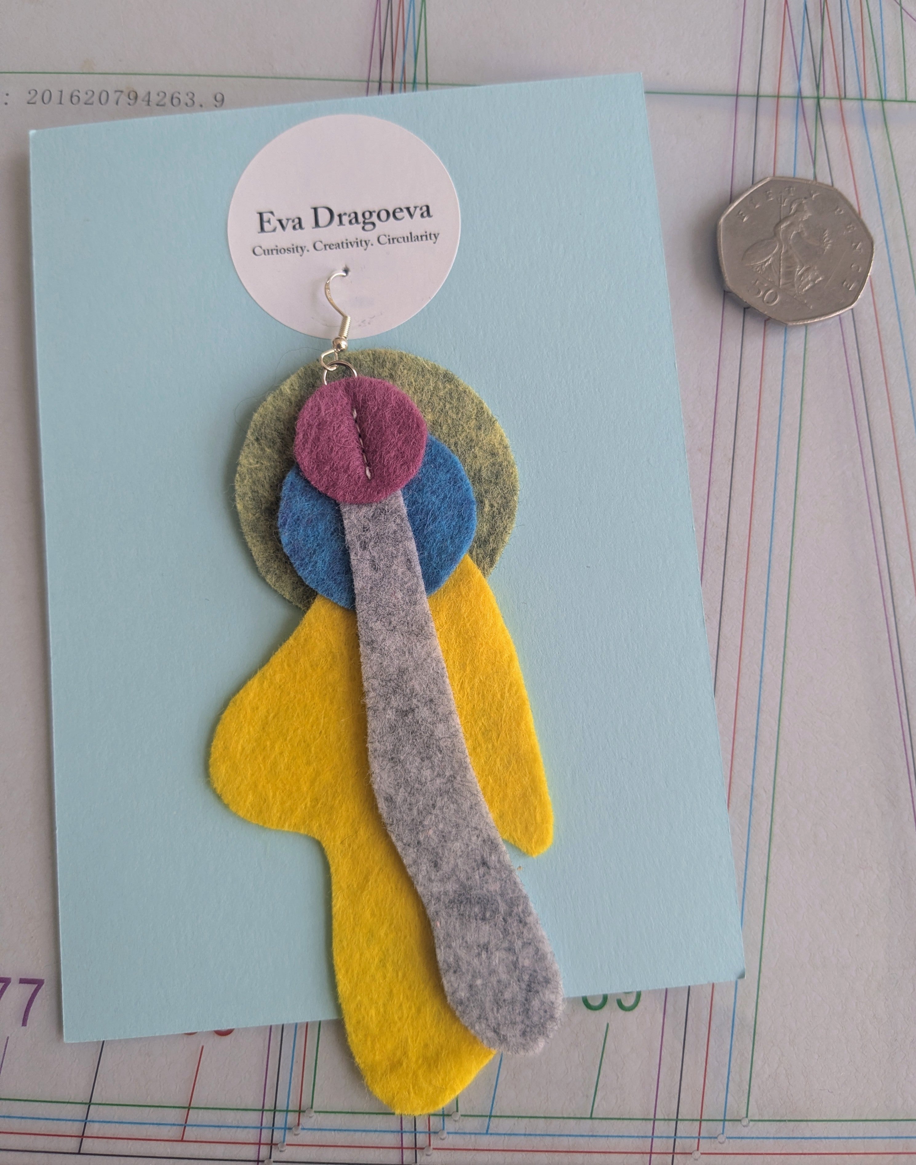Single abstract felt earring in yellow, purple, blue, green and grey