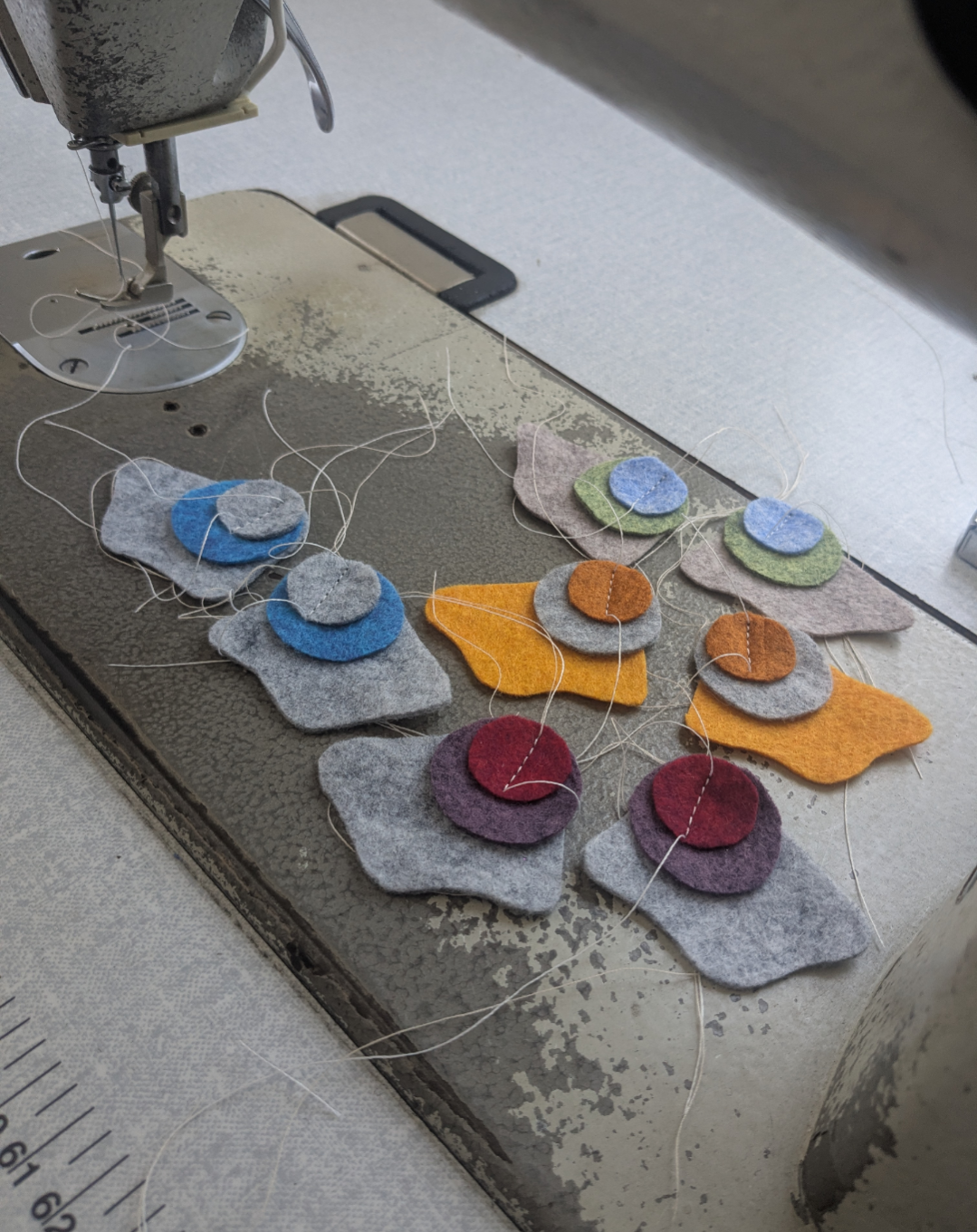 Small shell felt earrings