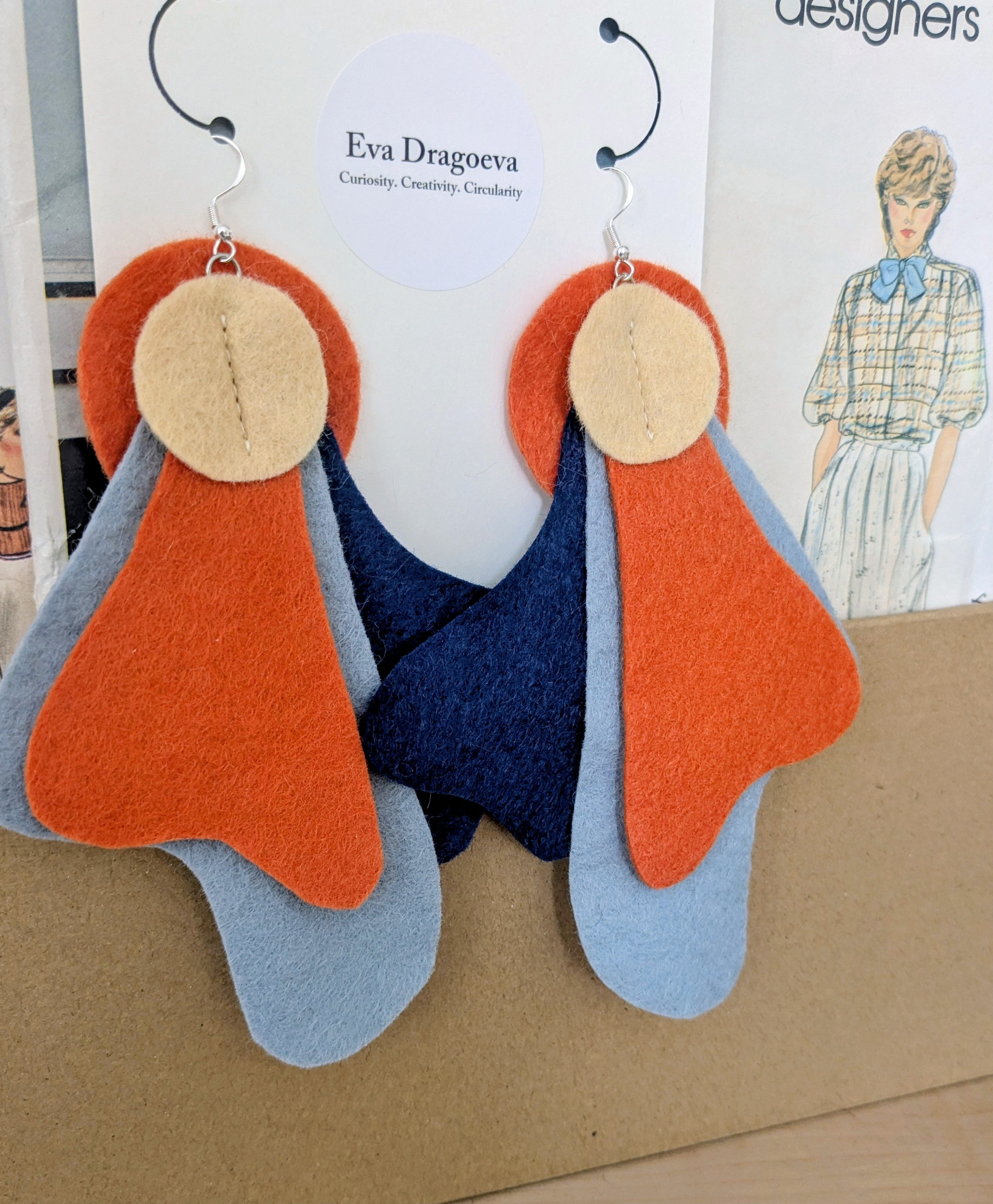 Large statement felt earrings in navy, yellow and orange