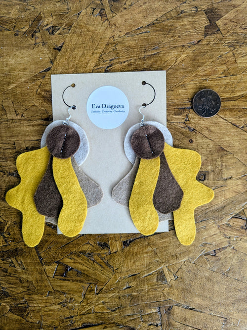 Large statement felt earrings in brown and orange