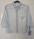 Upcycled denim shirt with a cool geometric pocket