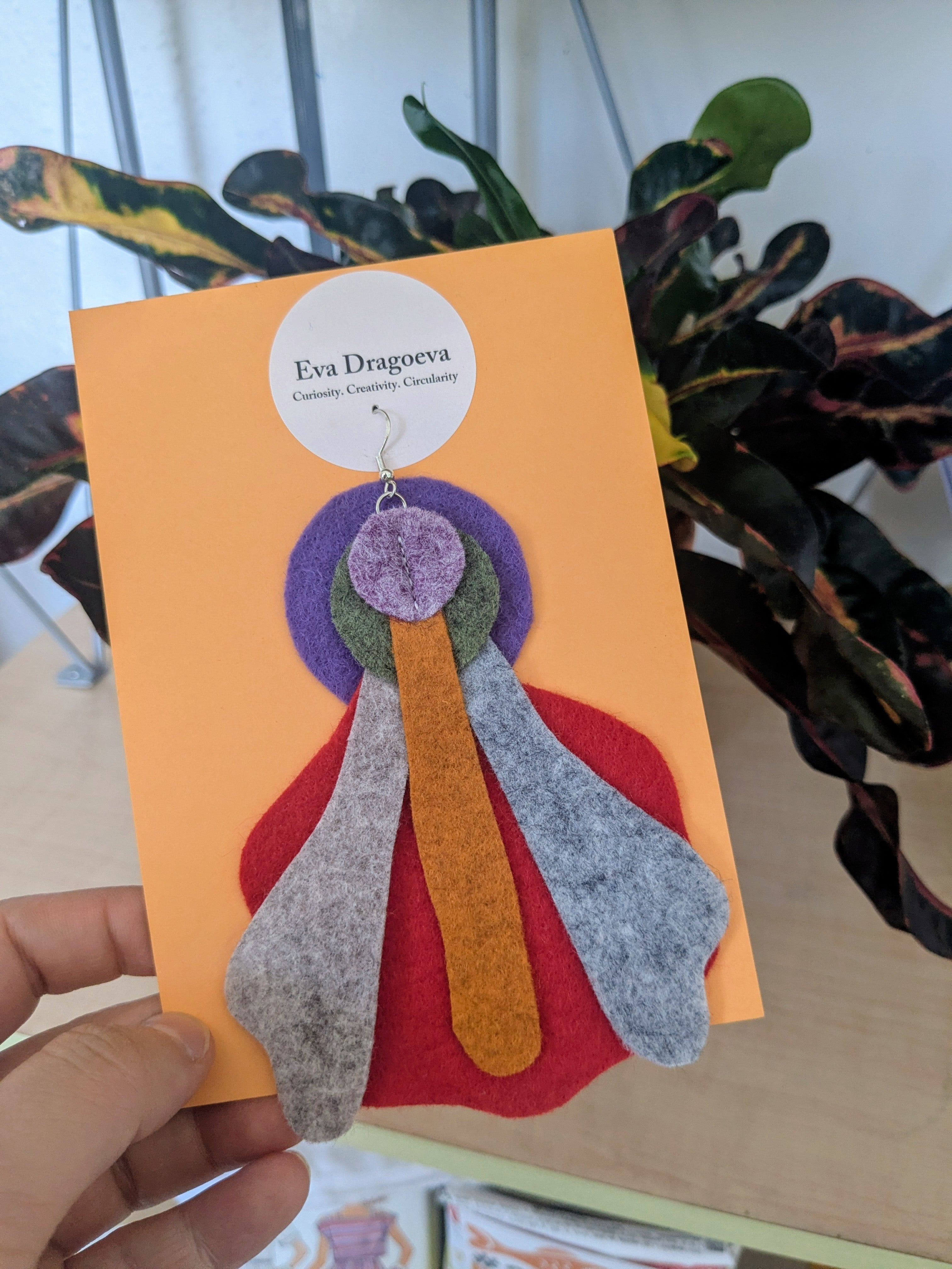 Single abstract felt earring in red, orange, purple and grey