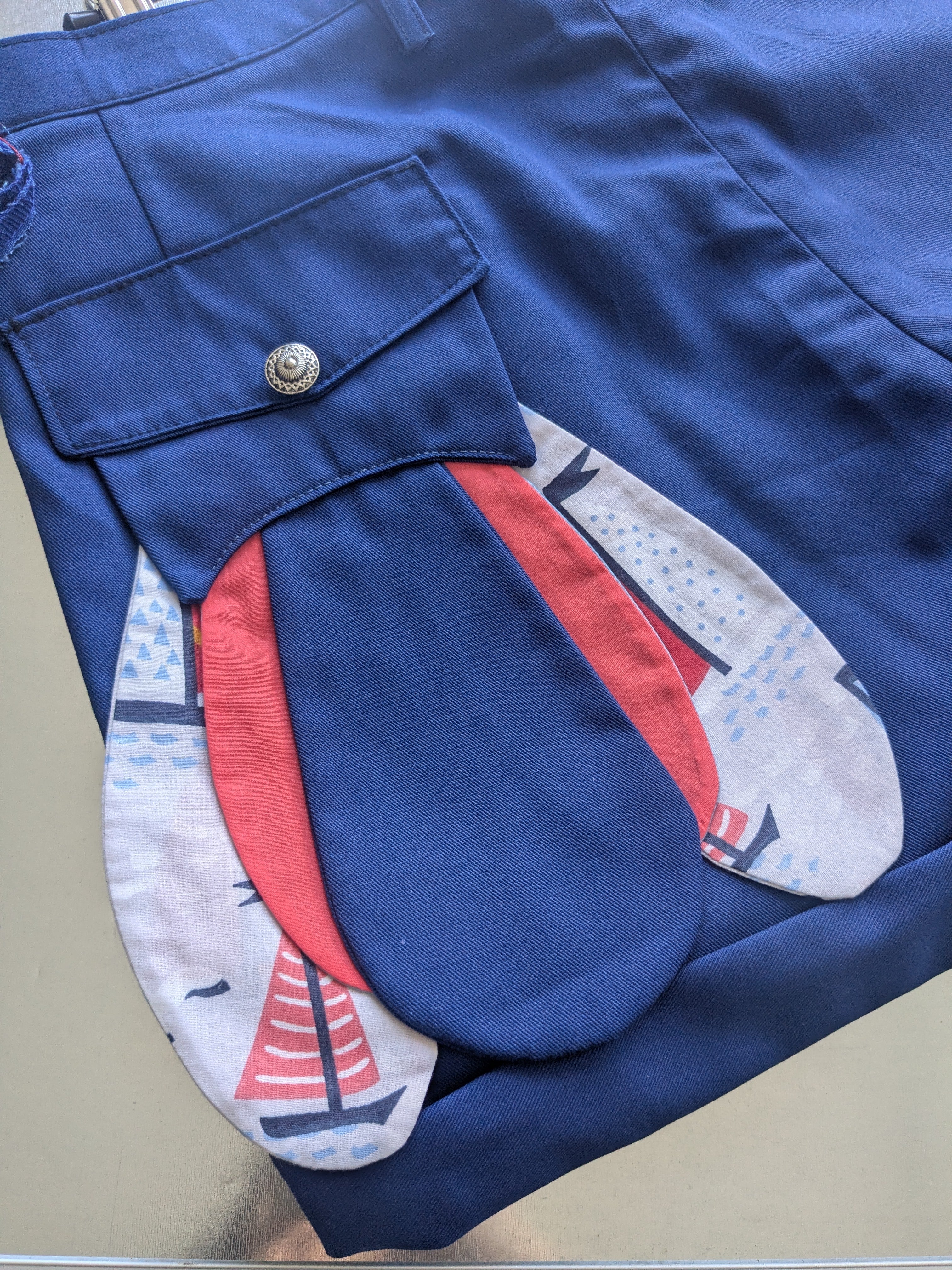 Upcycled navy shorts with nautical details