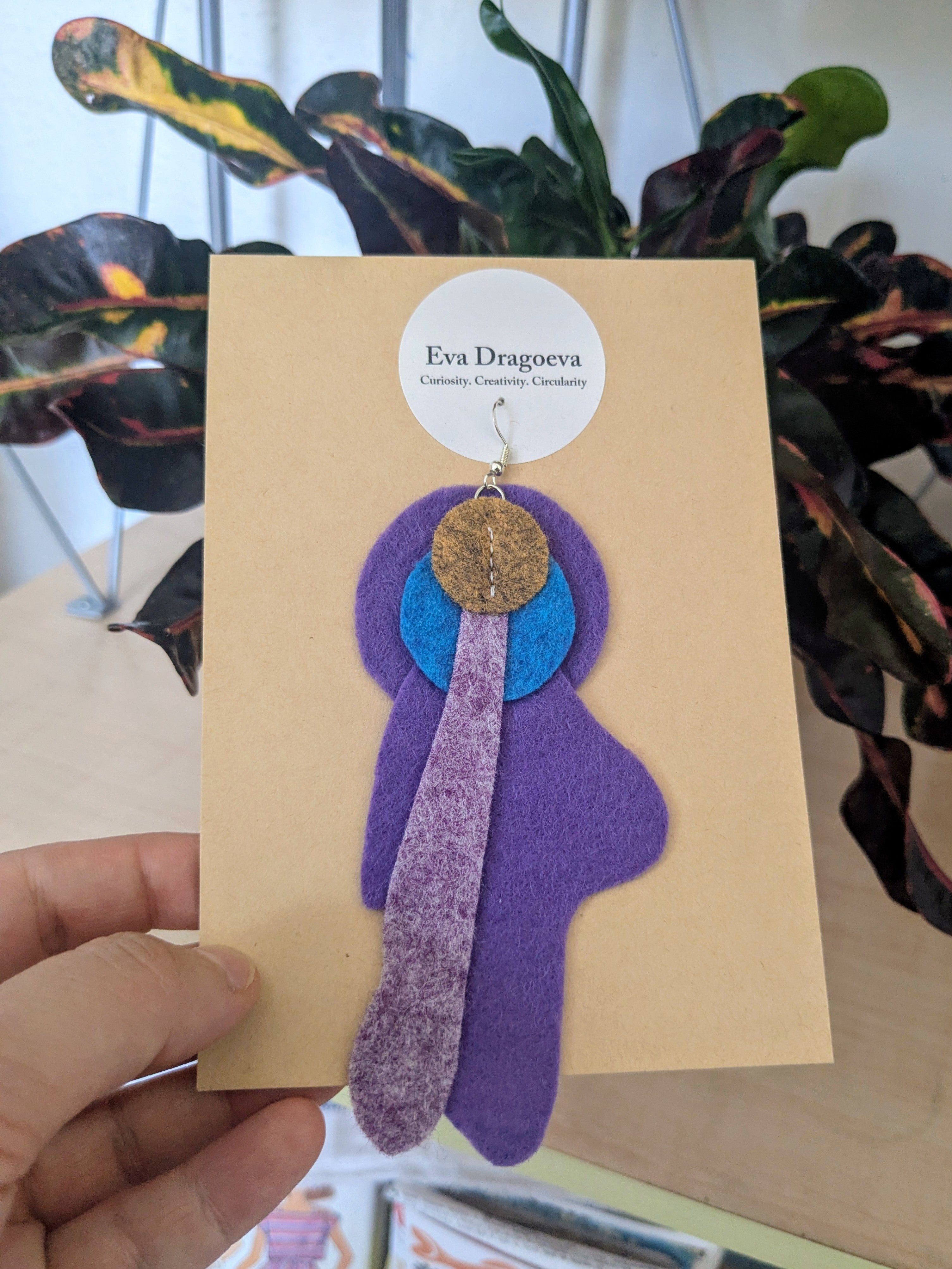 Single abstract felt earring in purple, blue and ochre