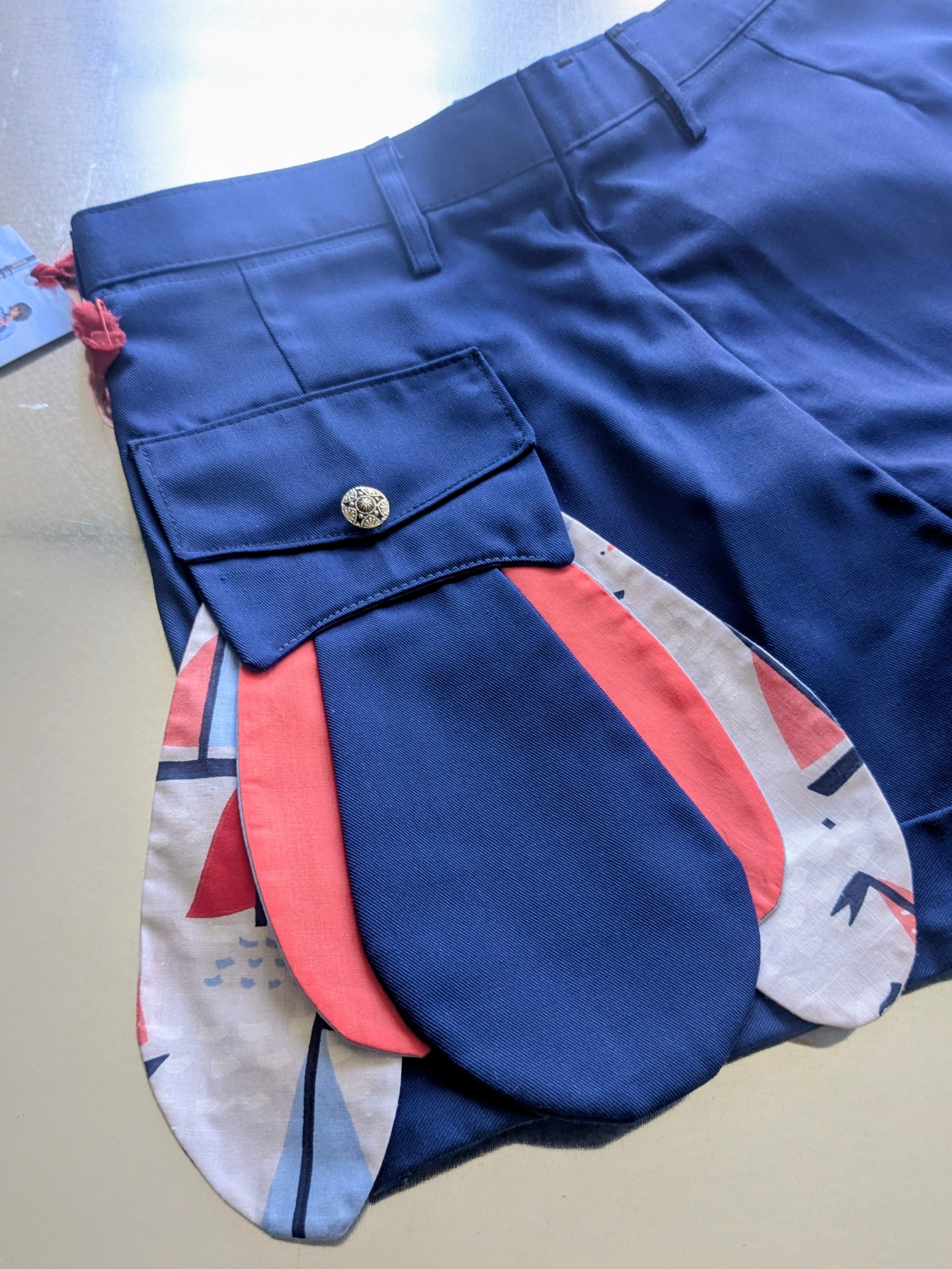 Upcycled navy shorts with nautical details