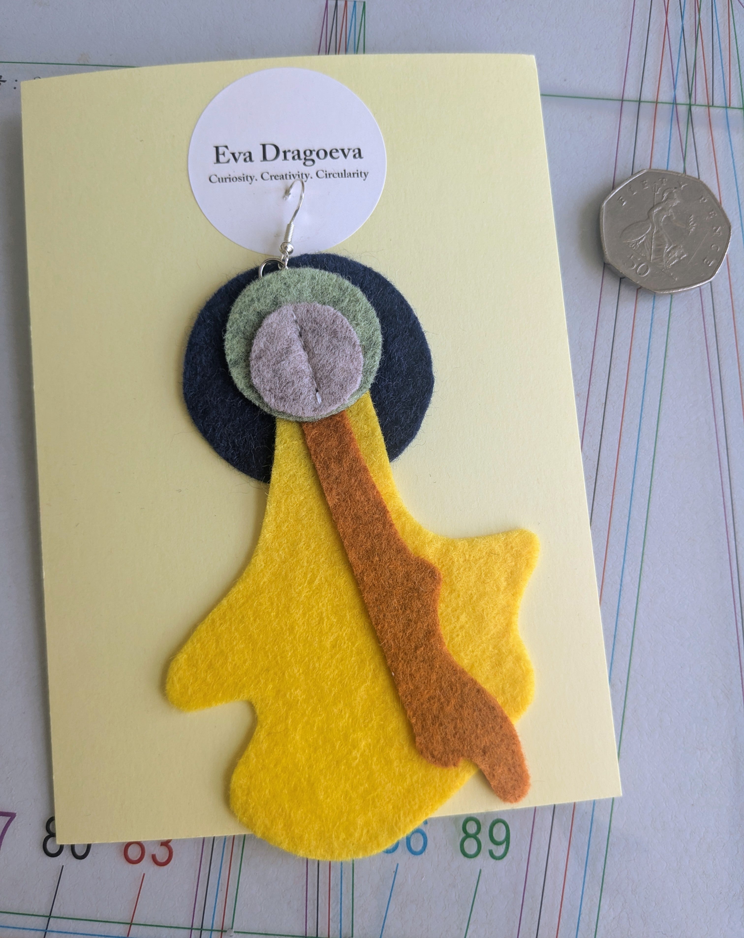 Single abstract felt earring in yellow, green, grey, navy and orange