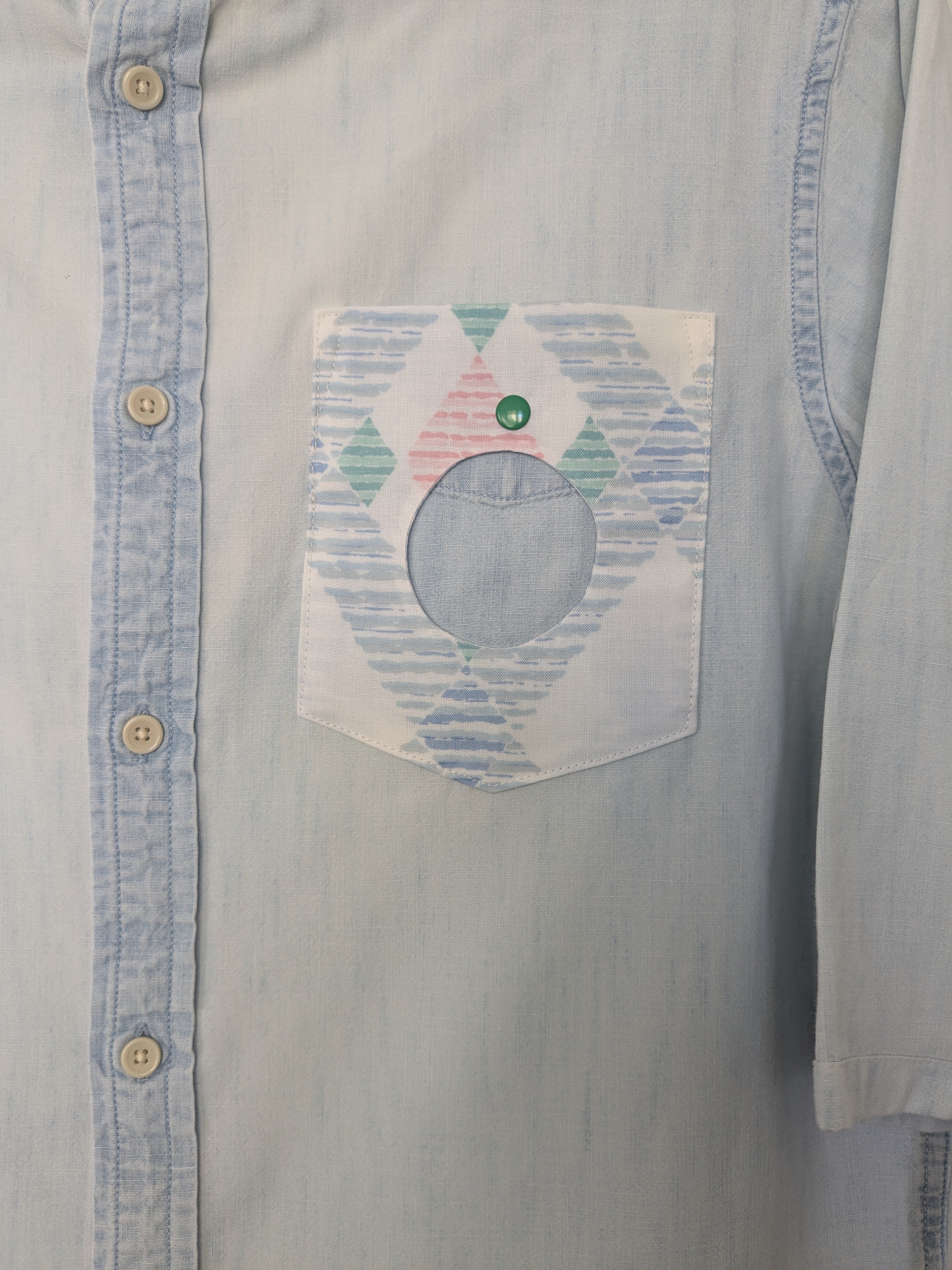Upcycled denim shirt with a cool geometric pocket